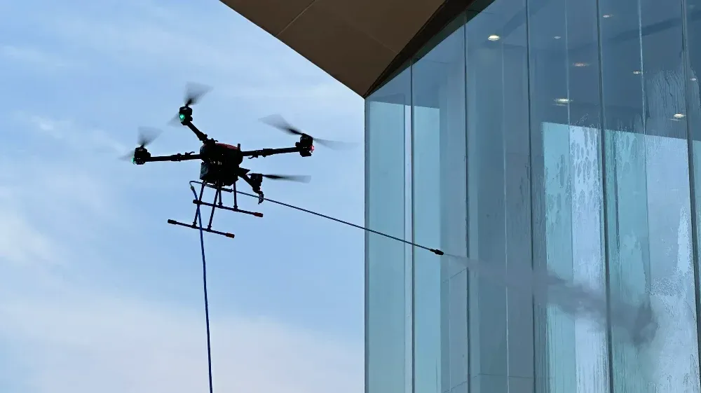 Hose-Fed Cleaning Drone Hose-Fed Cleaning Drone